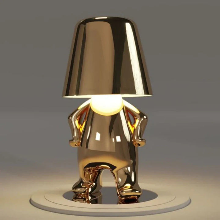 Bezprzewodowa lampa stołowa LED z figurką i regulacją jasności na komodzie