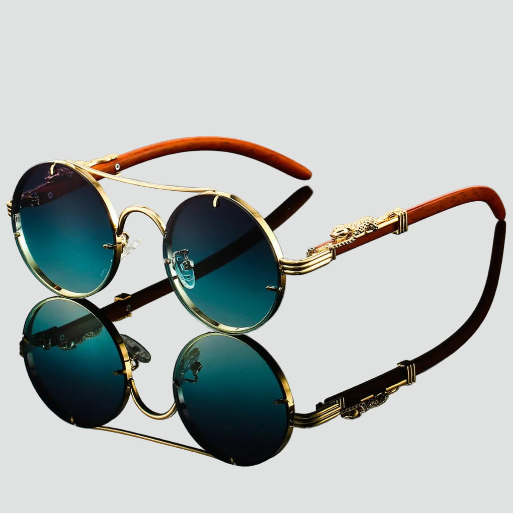 Damskie okulary przeciwsłoneczne retro z okrągłymi szkłami pokazane z boku z widocznym ozdobnym zausznikiem