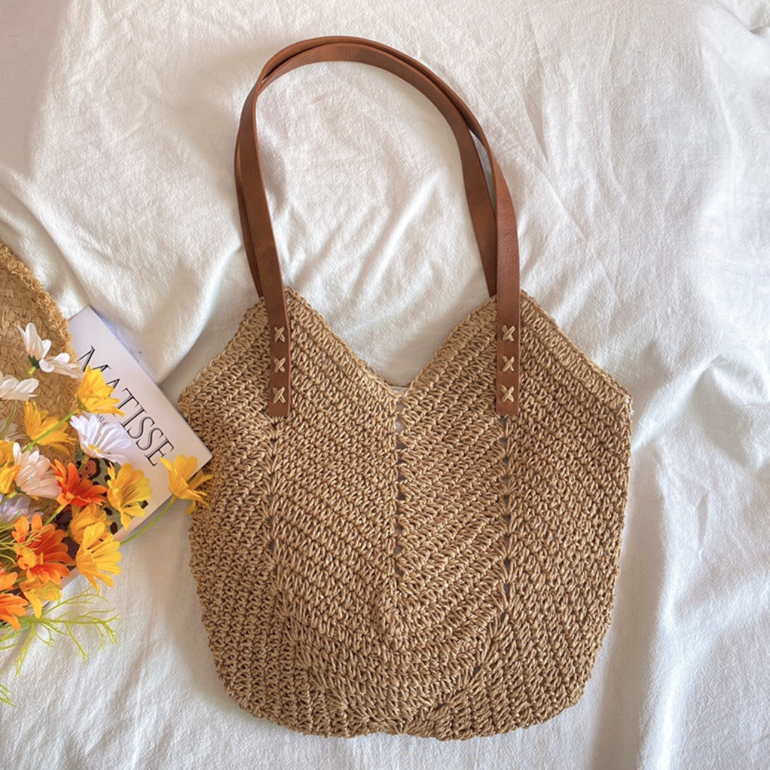 Torba damska pleciona z naturalnej plecionki w stylu shopper z regulowanym paskiem na ramię