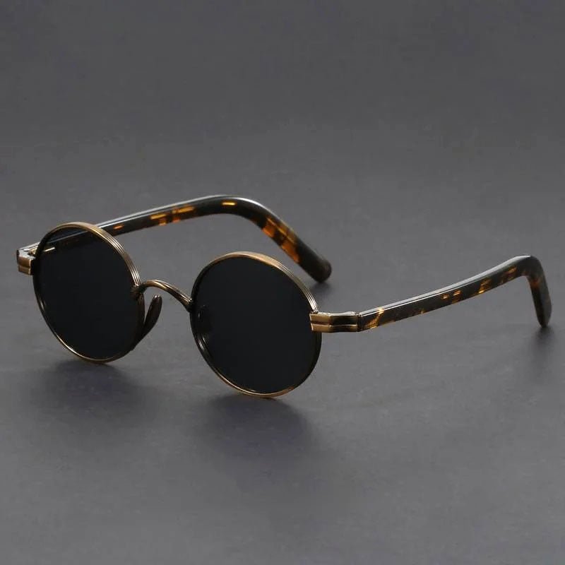 Damskie okulary przeciwsłoneczne w stylu vintage z okrągłą oprawą i kontrastowymi zausznikami szylkretowymi